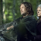 Daryl and Carol ride on a motorcycle together in The Walking Dead.